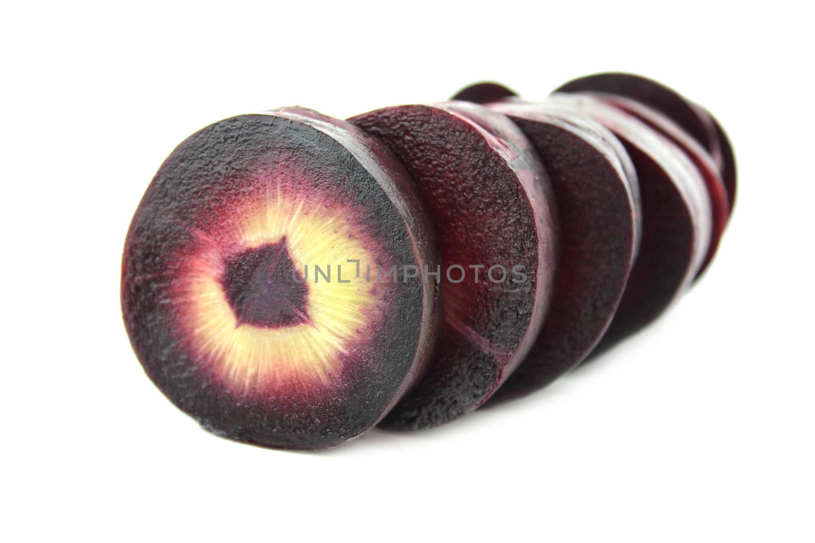 Sweet and fresh red carrots with slices isolated on white background