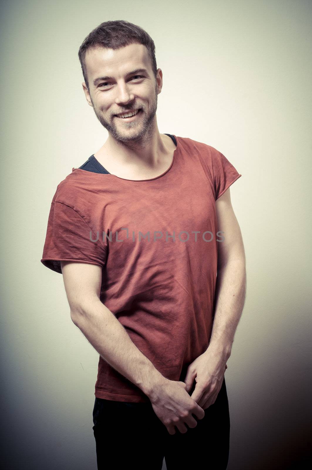 vintage portrait of fashion guy on gray background