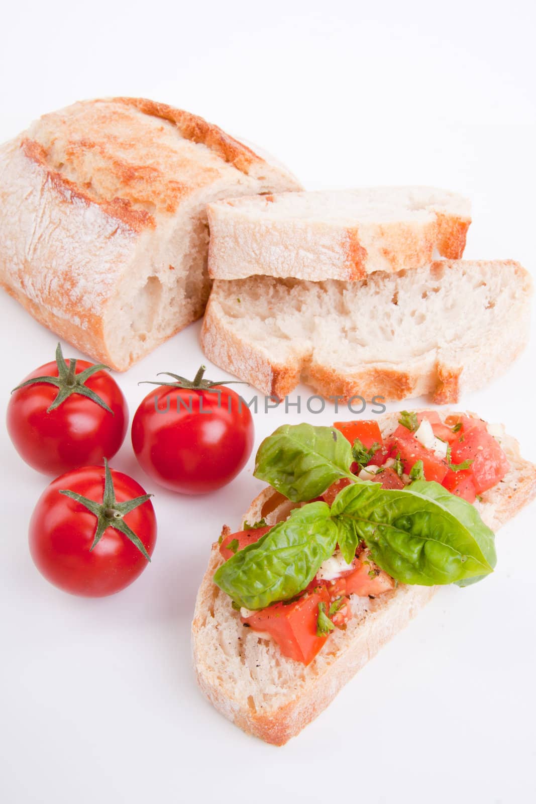deliscious fresh bruschetta appetizer with tomatoes isolated on white background