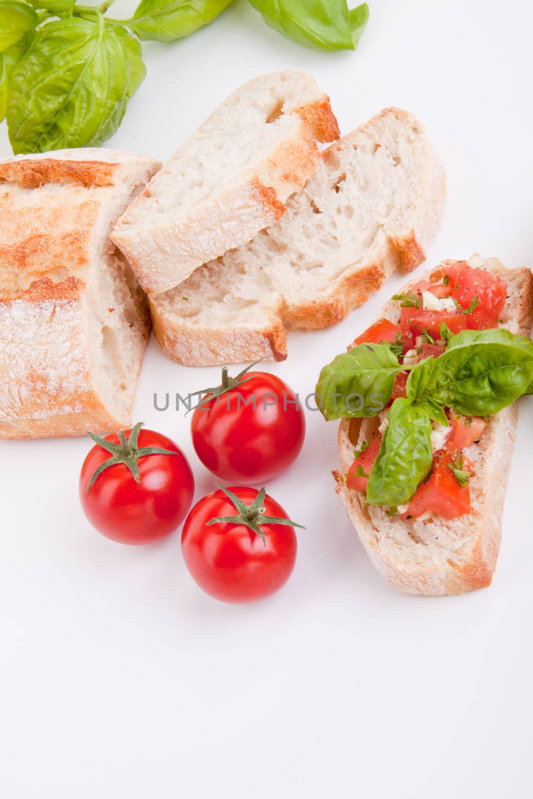 deliscious fresh bruschetta appetizer with tomatoes isolated on white background