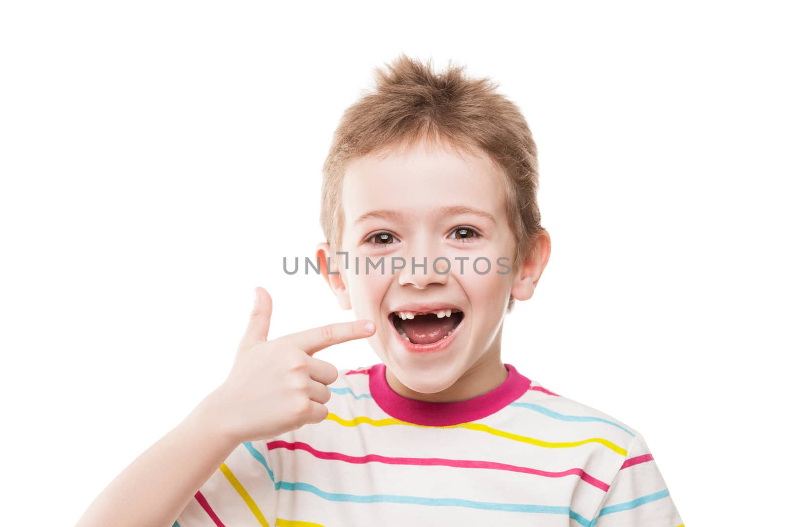 Little smiling child boy hand pointing his first baby milk or temporary teeth fall out