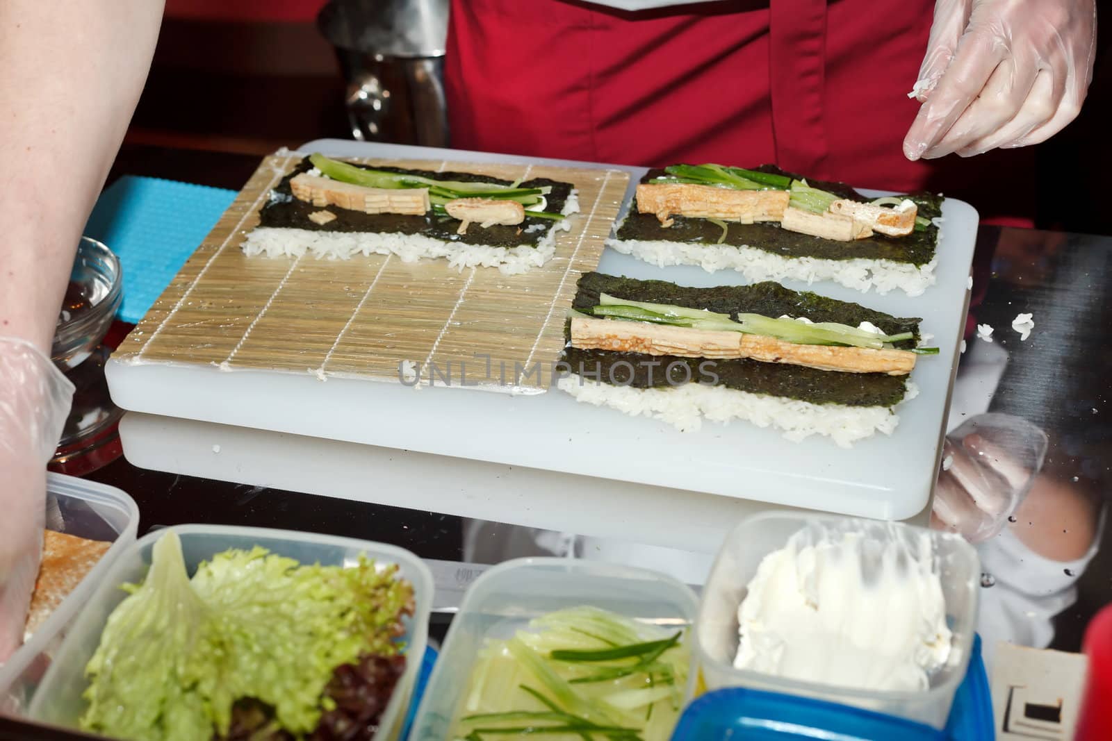 chef preparing sushi in the kitchen 