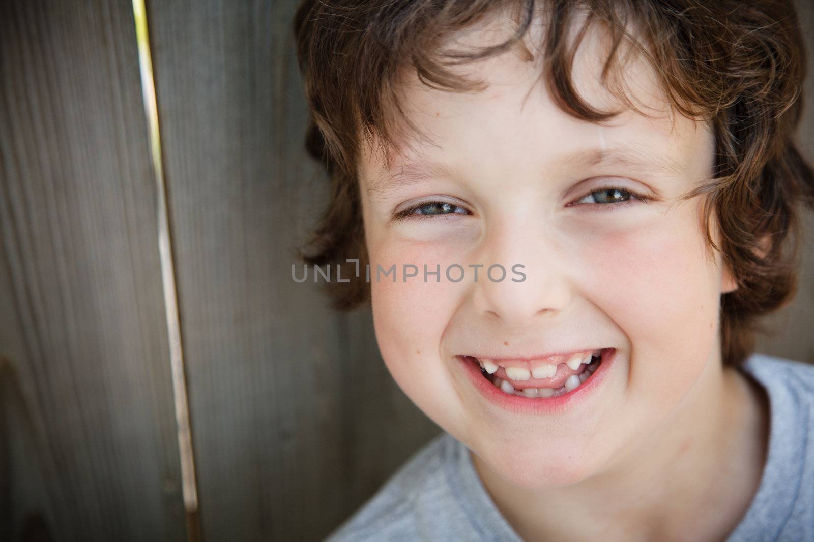 Boy laughing by Talanis