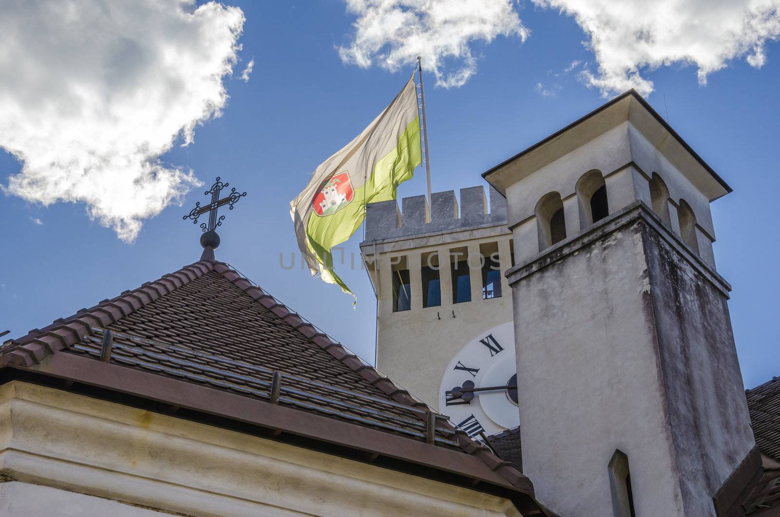 Ljubljana castle details  with flag of Ljubljana city.