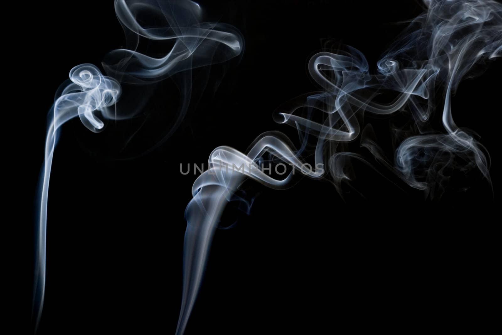 Two streams of abstract smoke trail, shapes and form.
