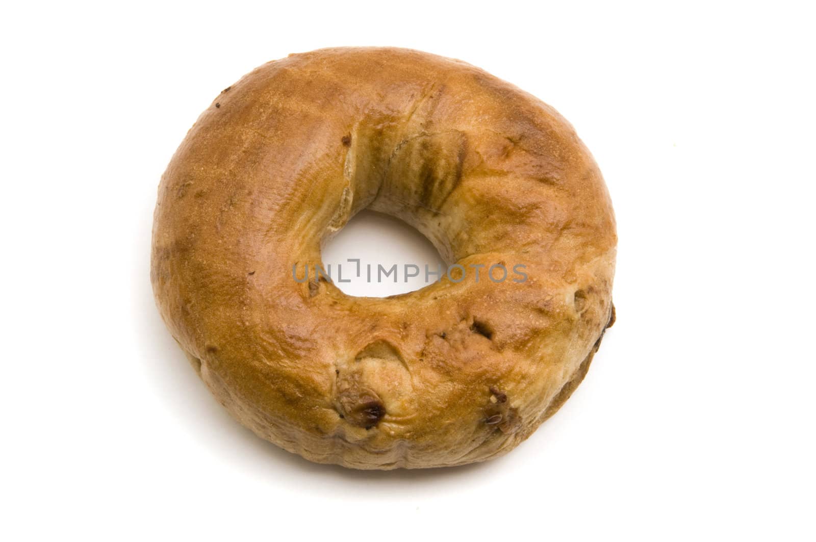 A single cinnamon bagel on white background