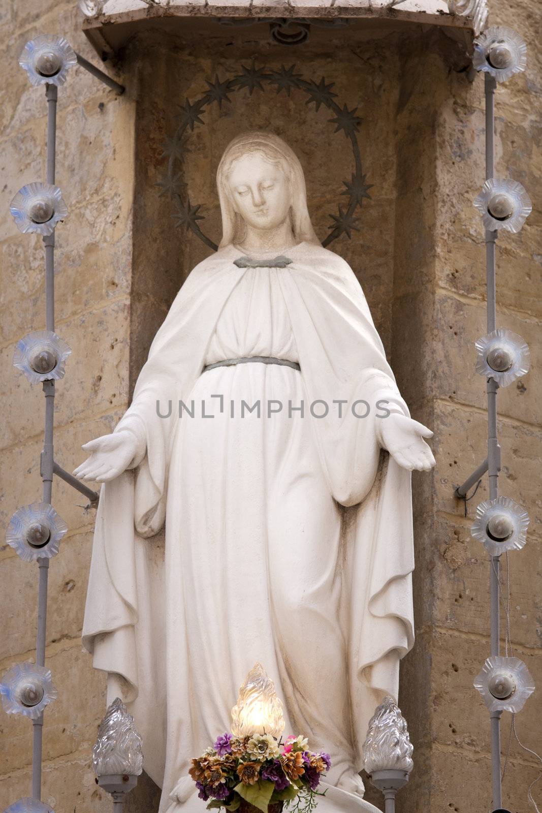 Statue of Virgin Mary on a building in Valletta, Malta