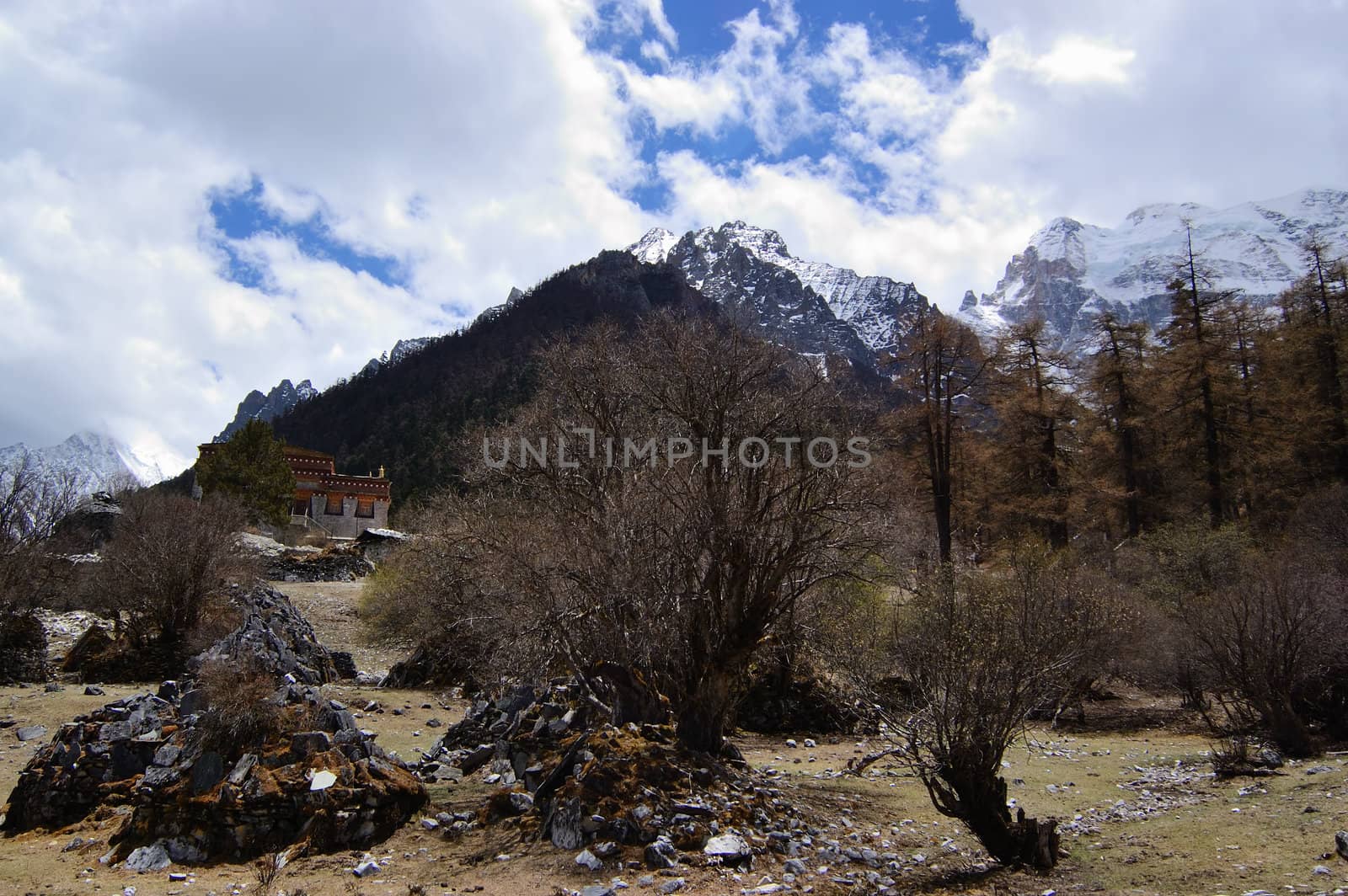 Tibetan mani stones by snow mountain by raywoo