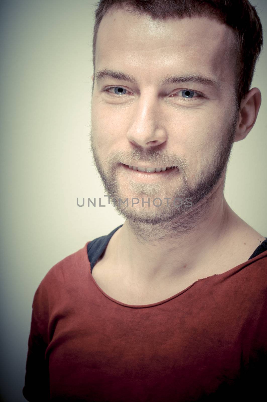 vintage portrait of fashion guy on gray background