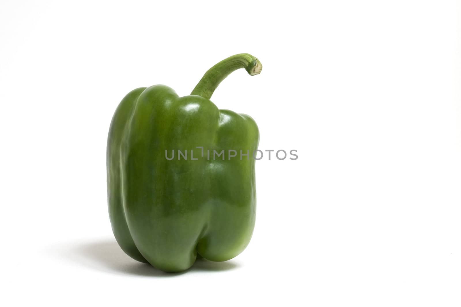 Green pepper on the white background