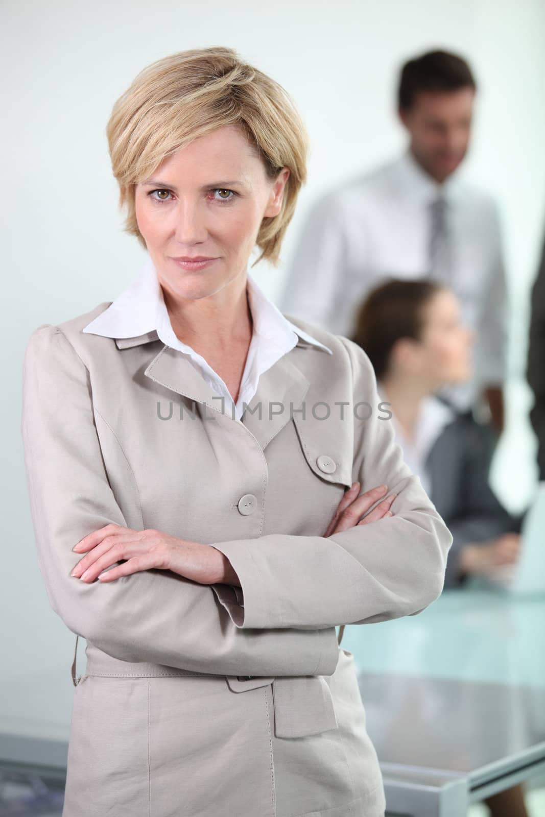 businesswoman standing by phovoir