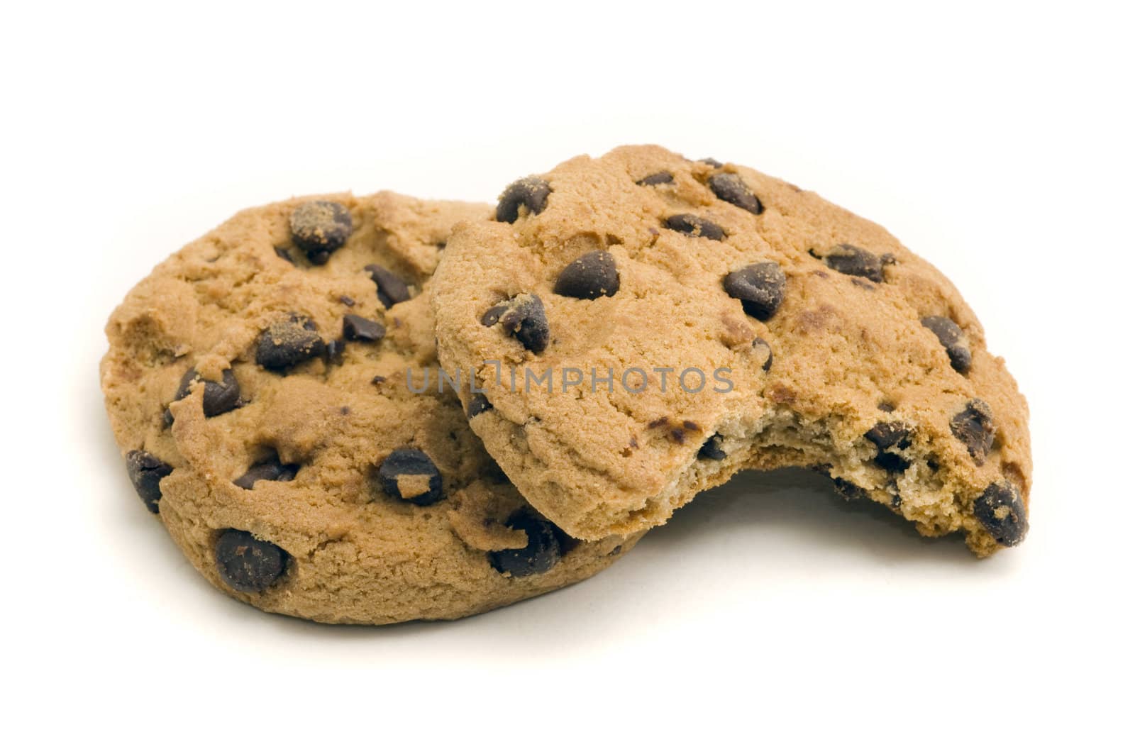 Two chocolate chip cookies with on with a bite out of it, on white background