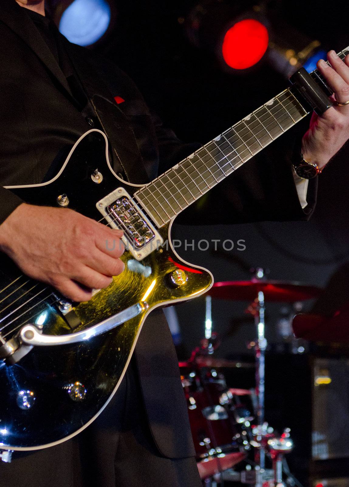 Musician playing the electric guitar at a blues festival