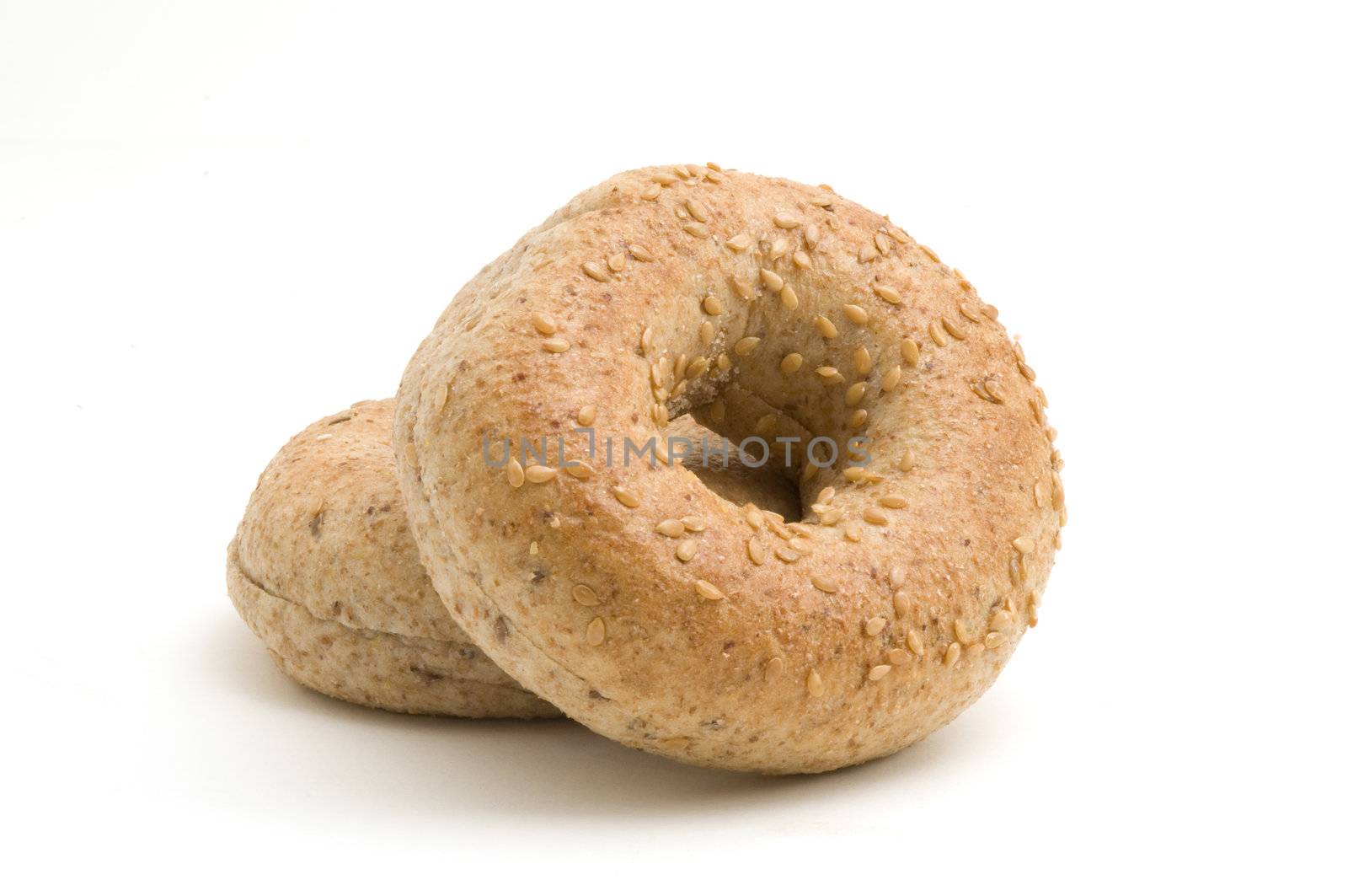 Whole grain bagels isolated on a white background