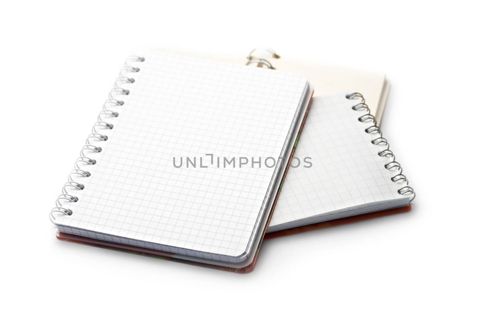 Notebooks isolated on white by Garsya