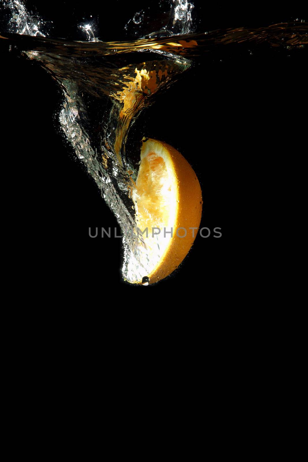 fresh lemon under water by sergey_nivens