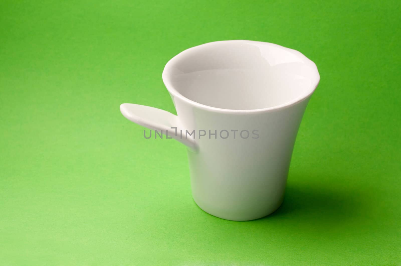 Mug isolated on green background