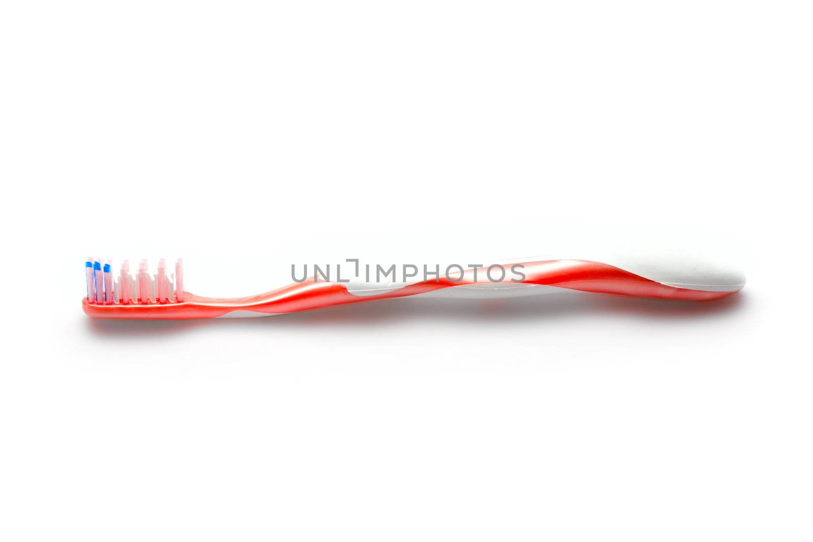 Toothbrush isolated on white by Garsya