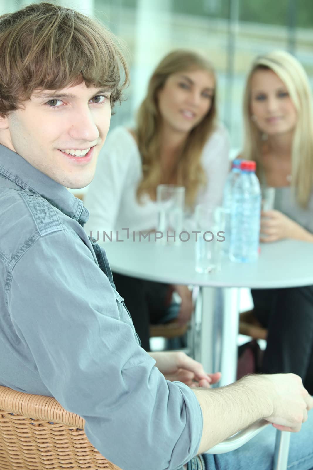 Teenagers with a glass of water