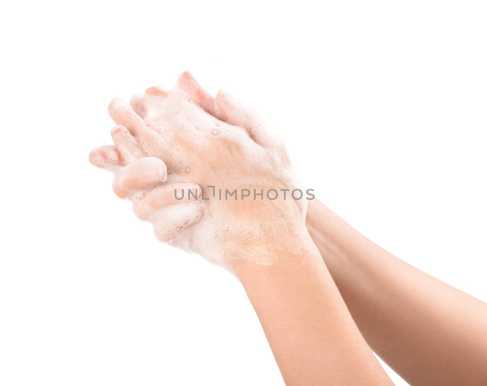 A woman washes her hands with soap. Isolated on white.