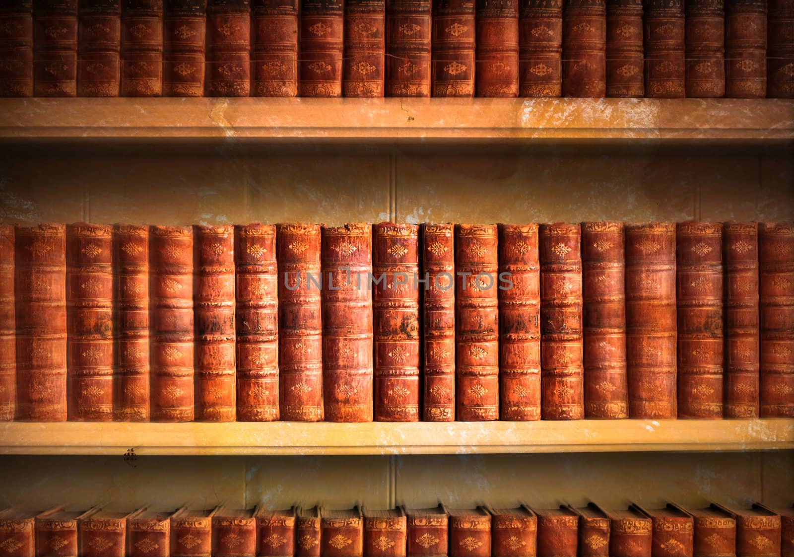 Collection of old weathered books in vintage tones