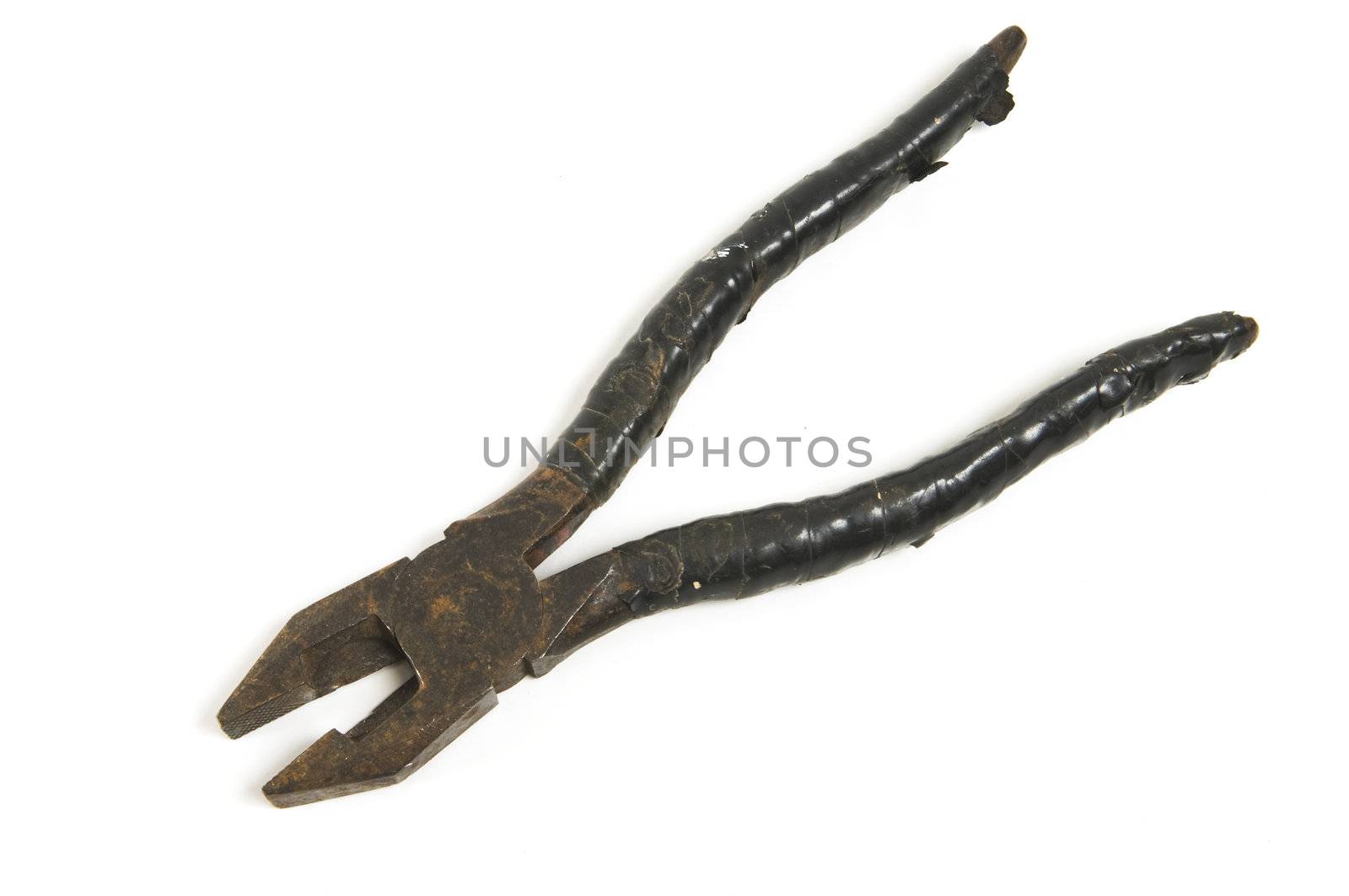Old pair of pliers isolated on a white background