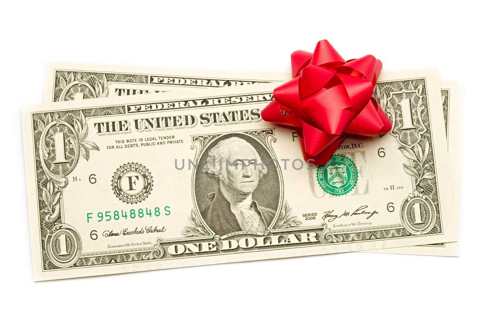 Dollar with holidays bow isolated on white by Garsya