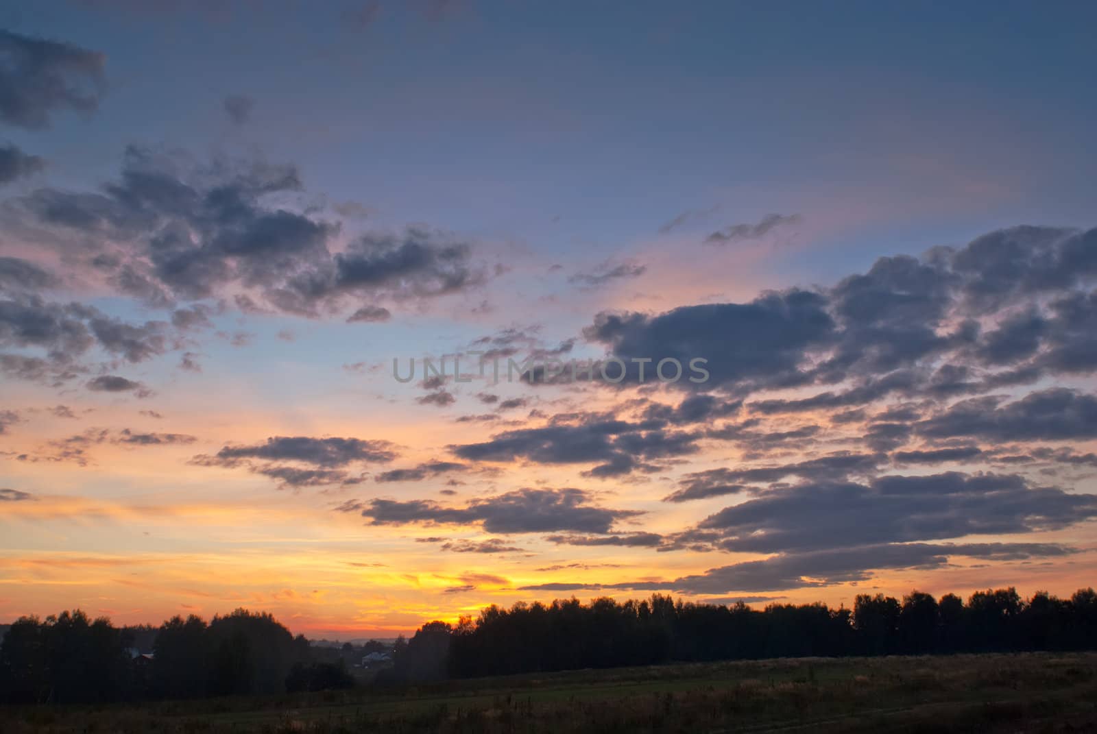 Sunset over rural landscape