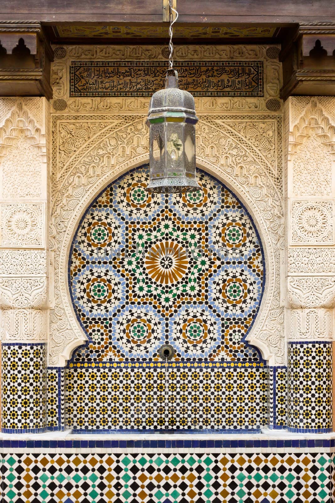 Moroccan arch and fountain with classic zellige tiles