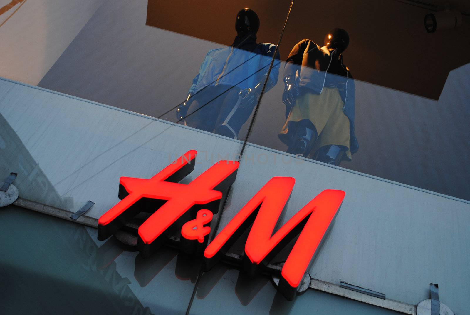 H & M Hennes & Mauritz AB (H&M) is a Swedish multinational retail-clothing company, known for its fast-fashion clothing for men, women, teenagers and children. H&M exists in 43 countries and as of 2011 employed around 94,000 people. It had 2,325 stores at end of 2011 and 2,629 stores at end of August 2012. It is ranked the second largest global clothing retailer, just behind Spain-based Inditex (parent company of ZARA).
