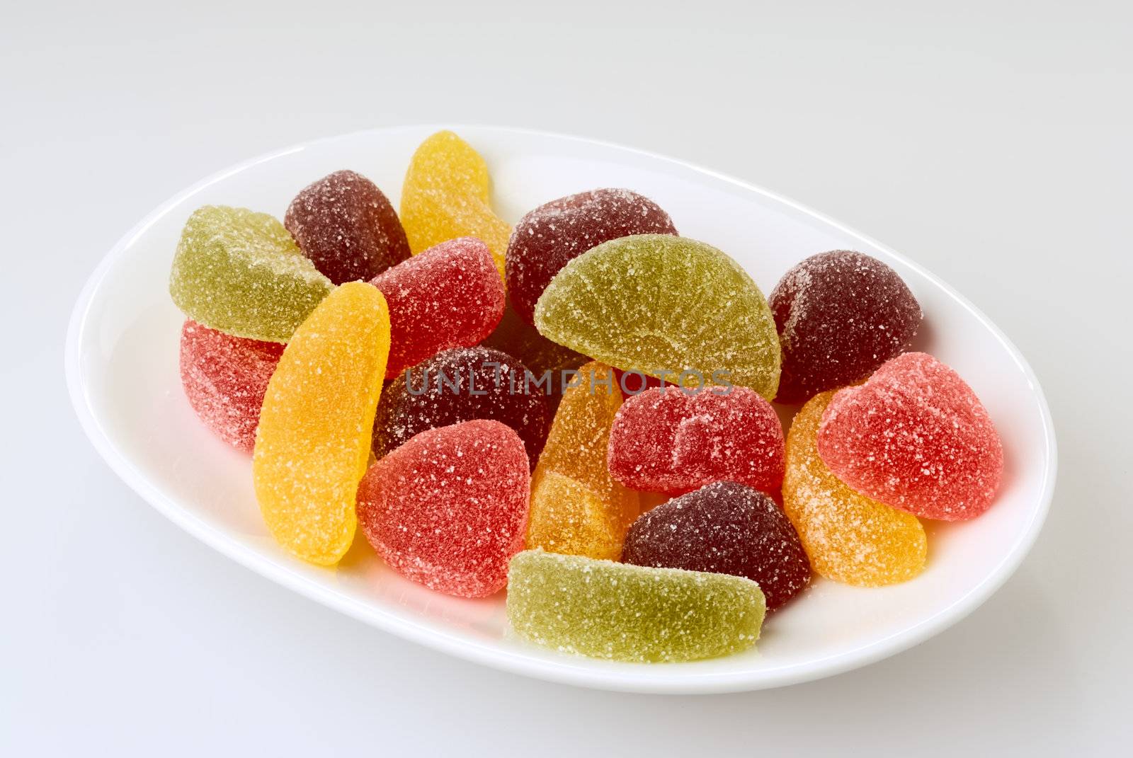 Fruit candy on plate by mahout