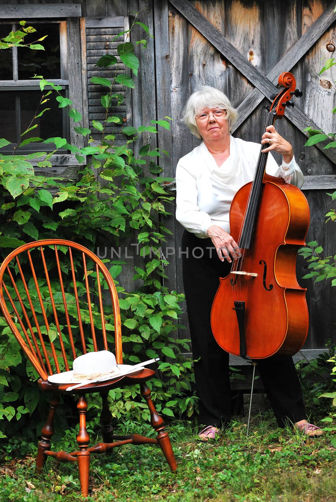 Female cellist. by oscarcwilliams