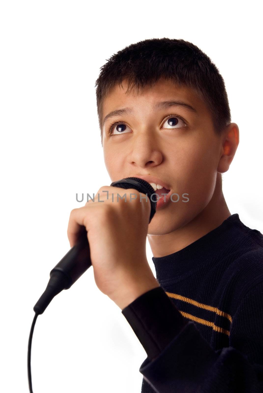 Photo of young boy singing a karaoke song