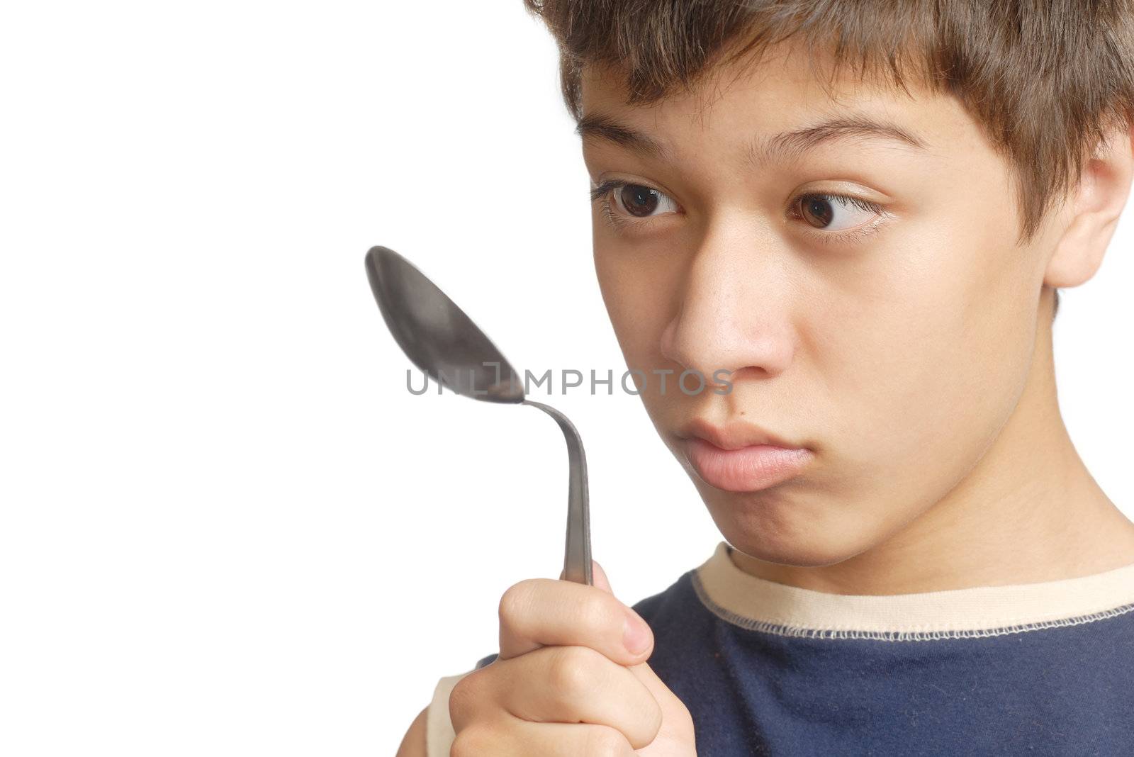 Young hypnotist and spoon distrorting under his glance
