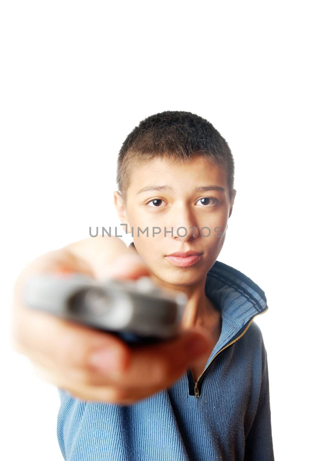 Studio photo of the boy with TV remote control device