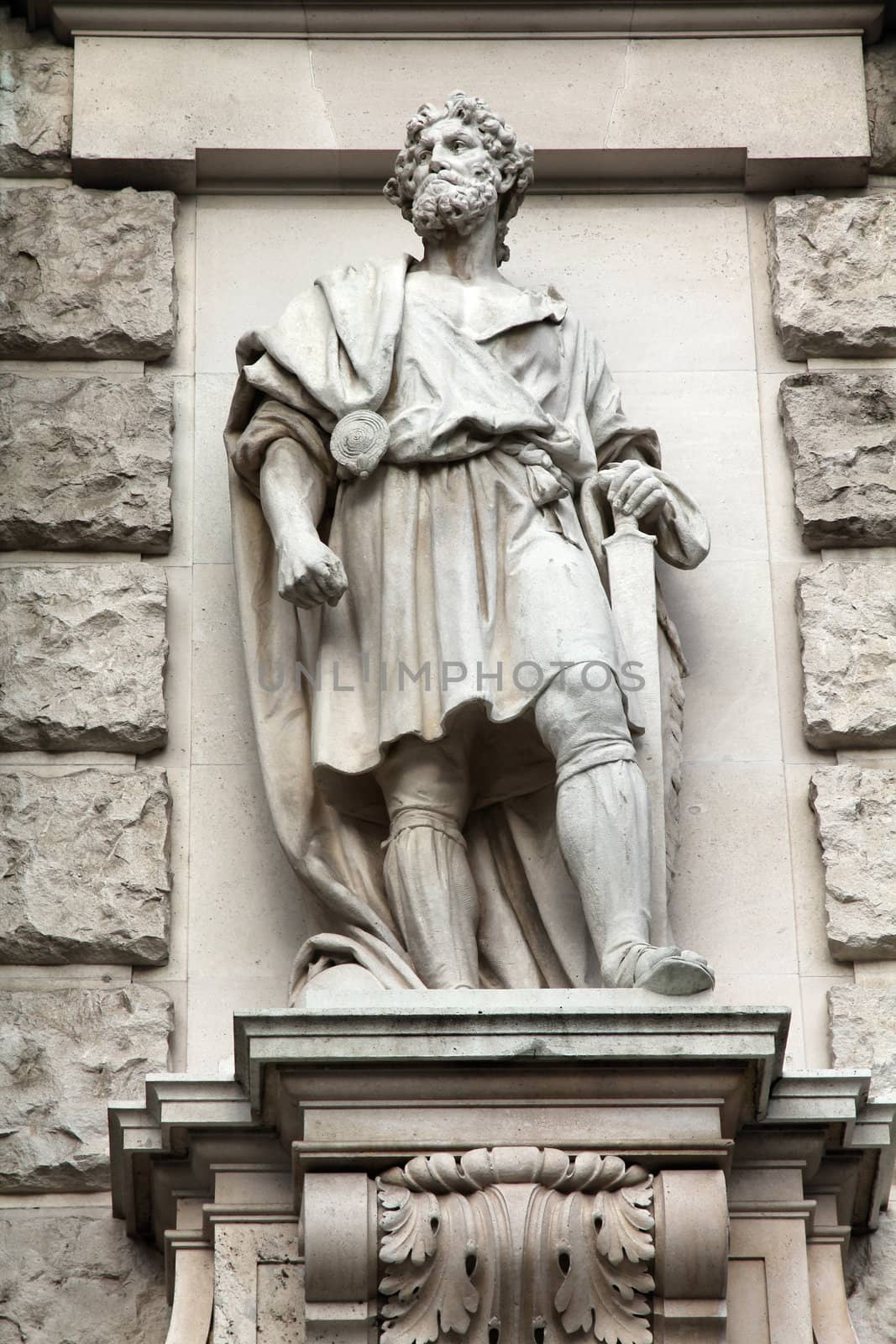 Vienna, Austria - statue in Neue Burg (part of Hofburg palace) facade. Sculpture depicts Marcomanni Germanic tribe. The Old Town is a UNESCO World Heritage Site.