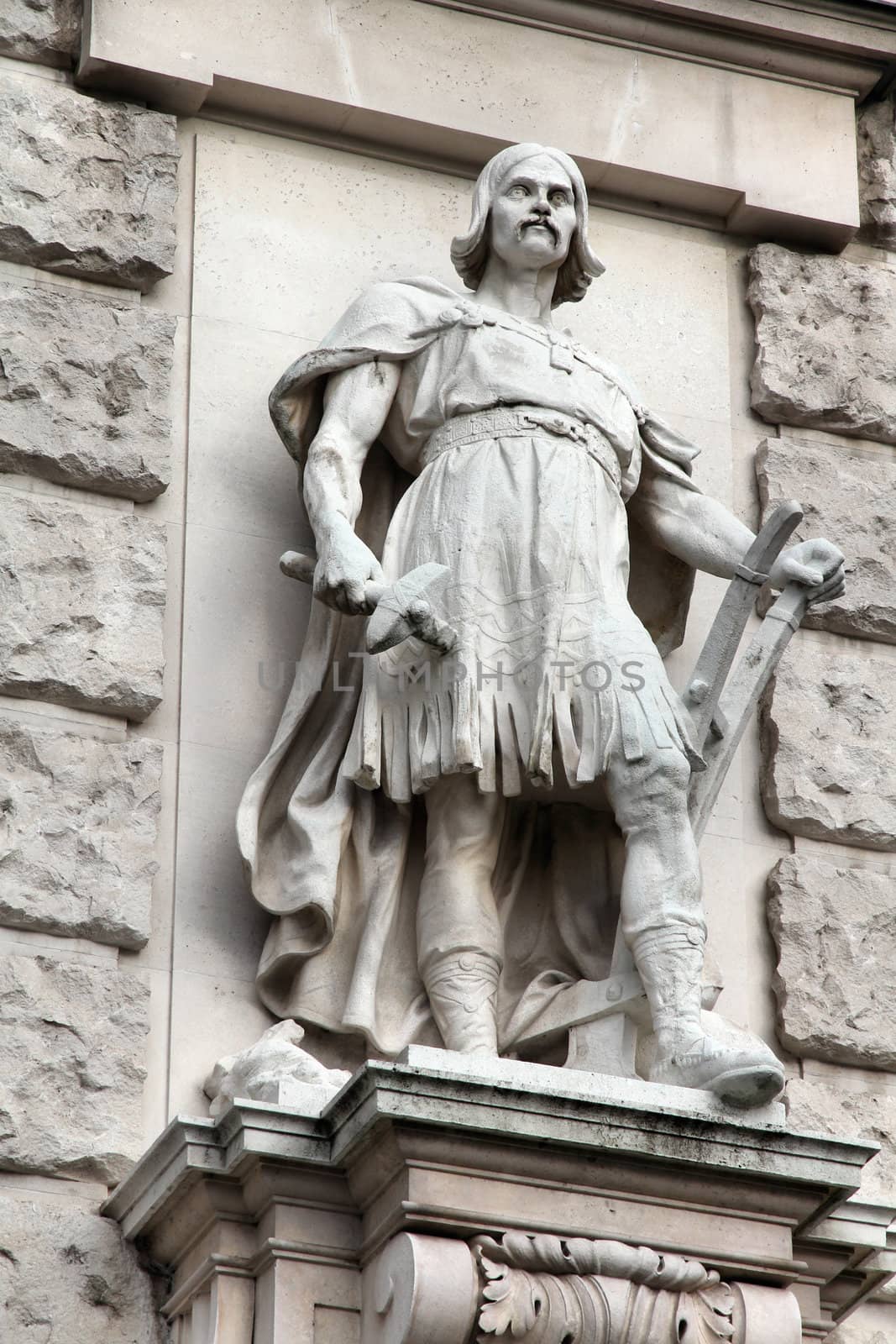 Vienna, Austria - statue in Neue Burg (part of Hofburg palace) facade. Sculpture depicts Slavic people. The Old Town is a UNESCO World Heritage Site.