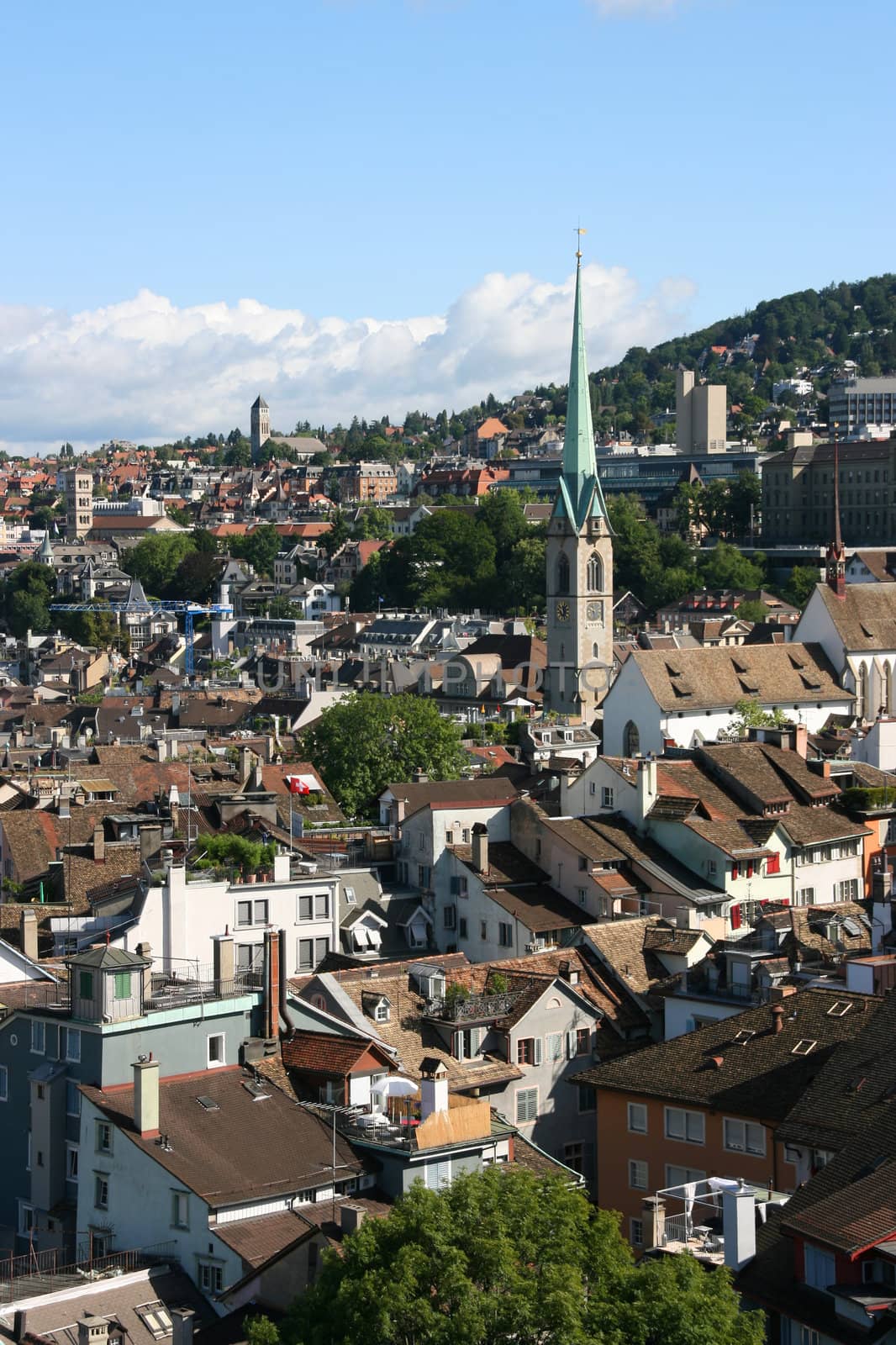Cityscape of Zurich, Switzerland taken from Grossmuenster church. The distinctive tower is Predigerkirche (Preacher's Church).