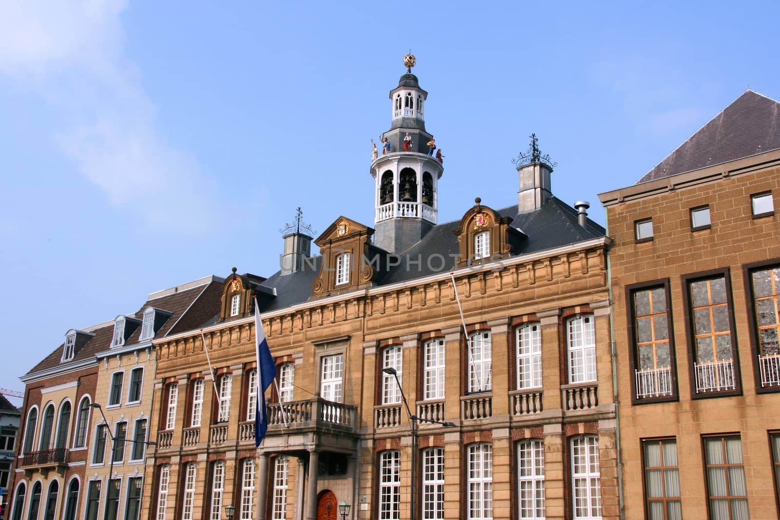 Beautiful town hall of Roermond, Limburg, Netherlands. The top features dancing figures and bells.