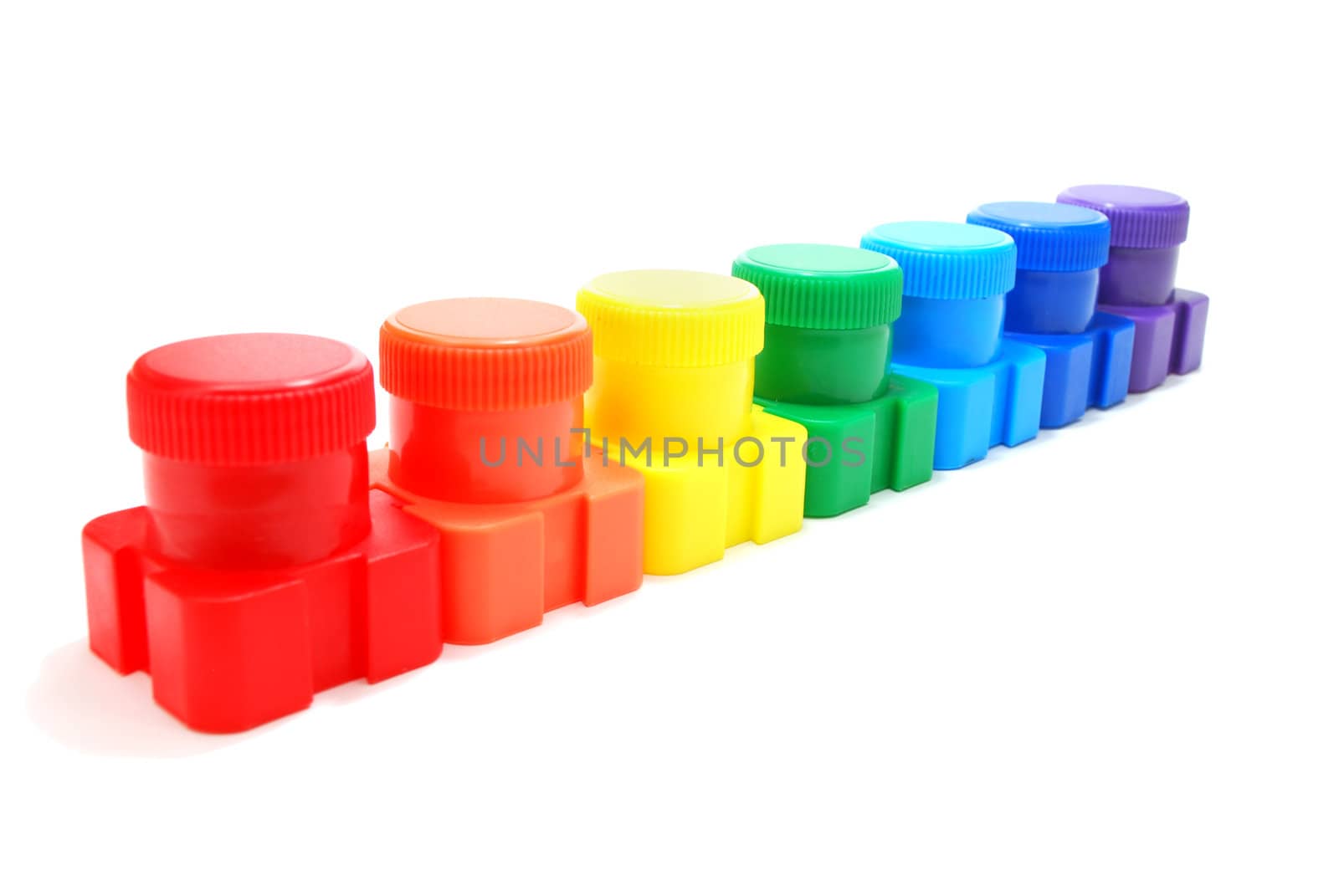 Set of Colored Ink (Paint) Cans in Row Isolated on White