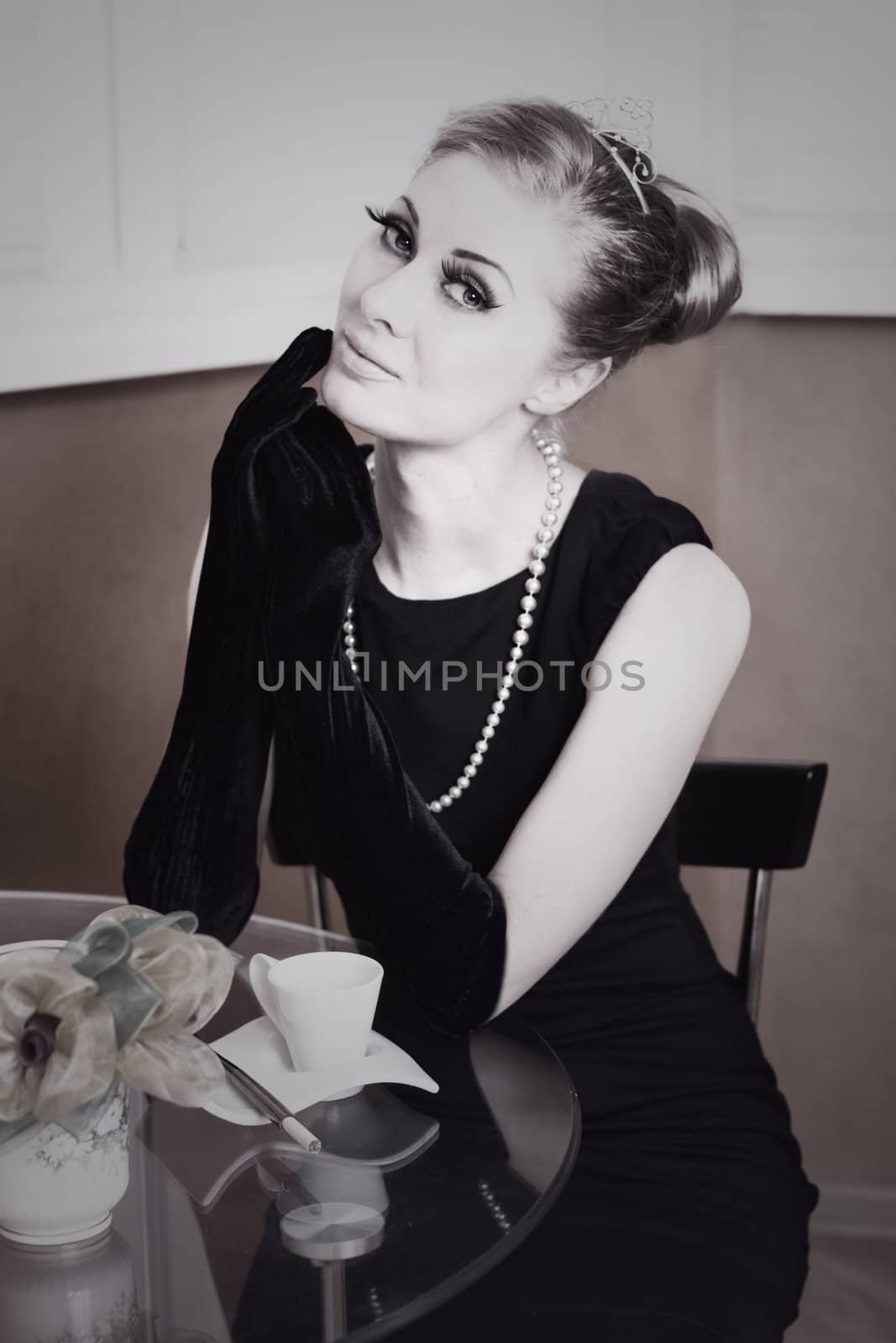 Retro styling woman in black dress and gloves by Angel_a