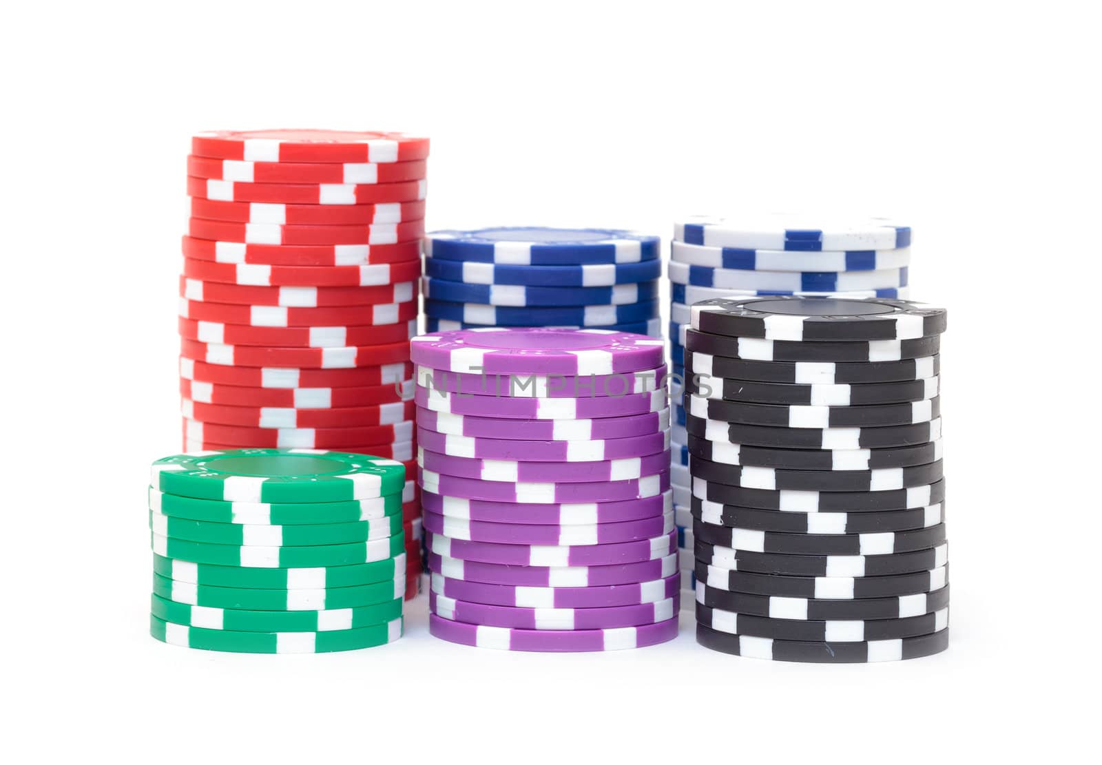 Stacks of Multicolored Poker Chips, closeup on white background