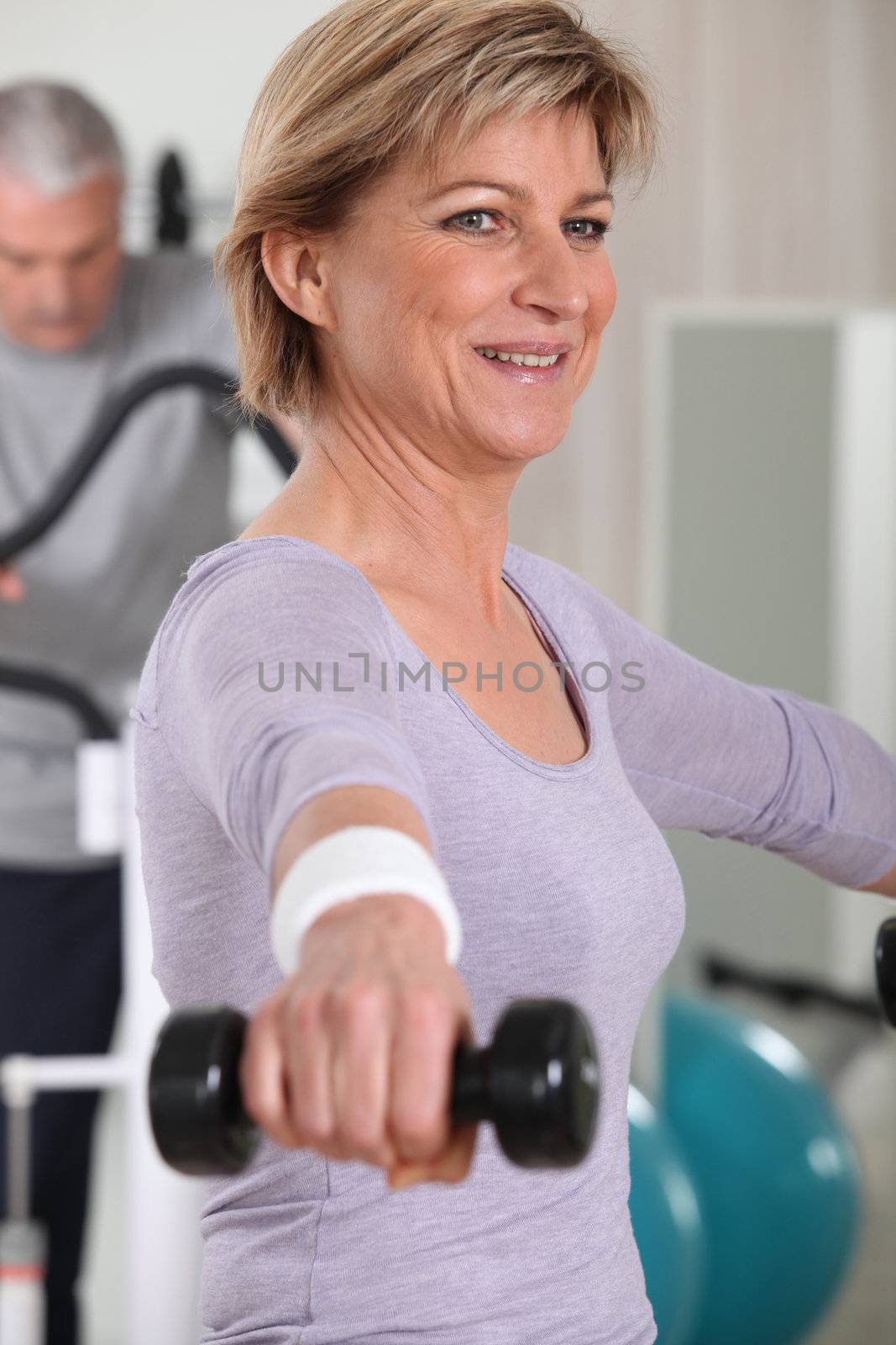 Older people in the gym by phovoir
