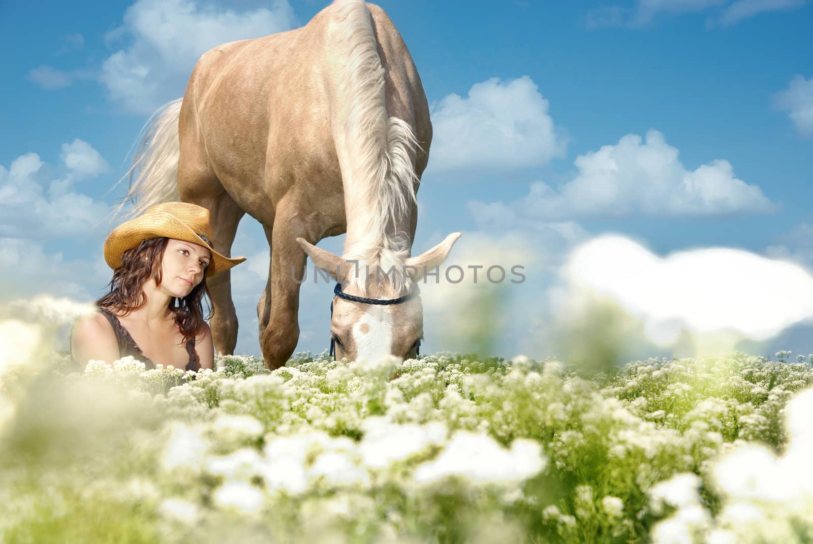 Photo of serene woman sitting near her horse