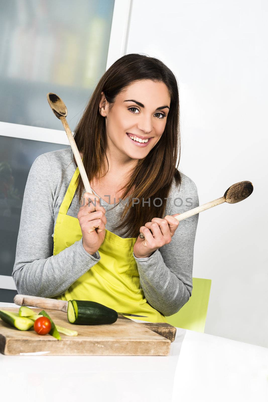 Young Woman Cooking. Healthy Food - Vegetable Salad. Diet. Dieting Concept. Healthy Lifestyle. Cooking At Home. Prepare Food 