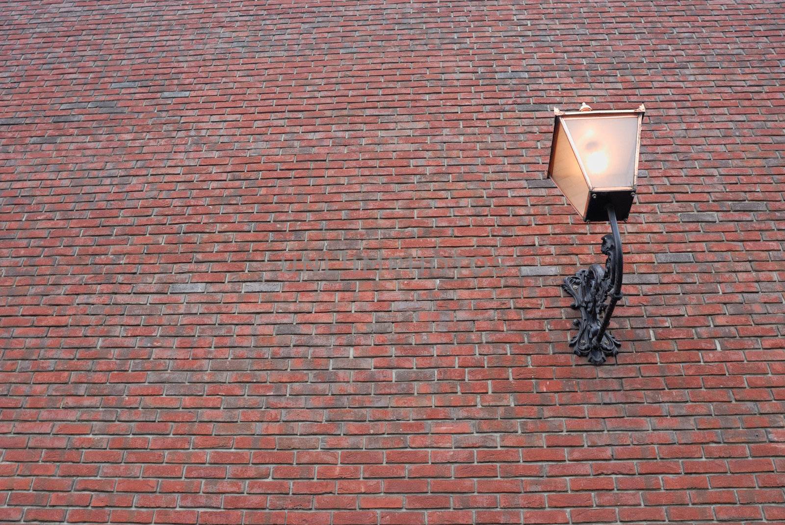 Brick wall with lantern