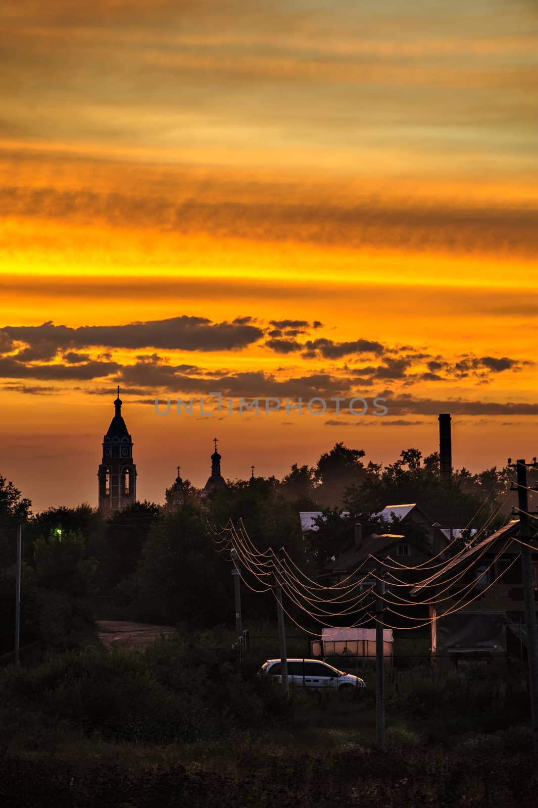 Bright sunset over russian small town