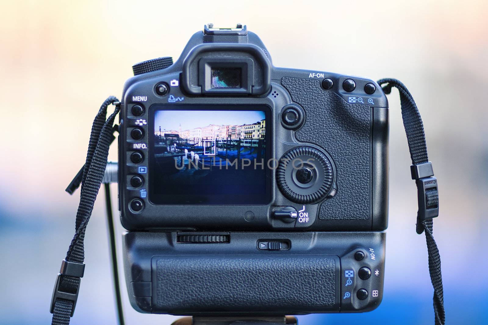 Tourist's digital photo camera on vacations, taking picture