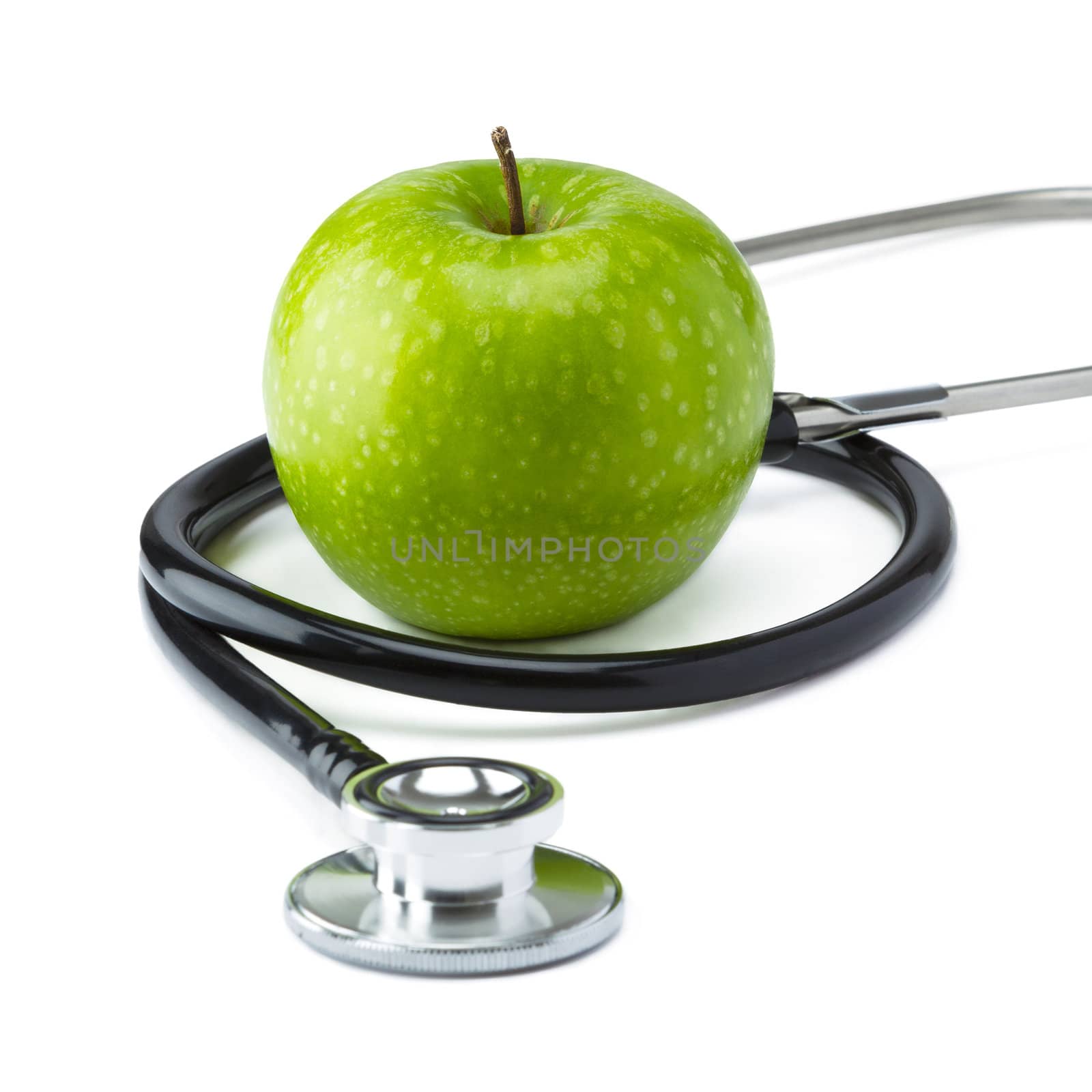 Green Apple Granny Smith with medical stethoscope isolated on white background for healthy eating
