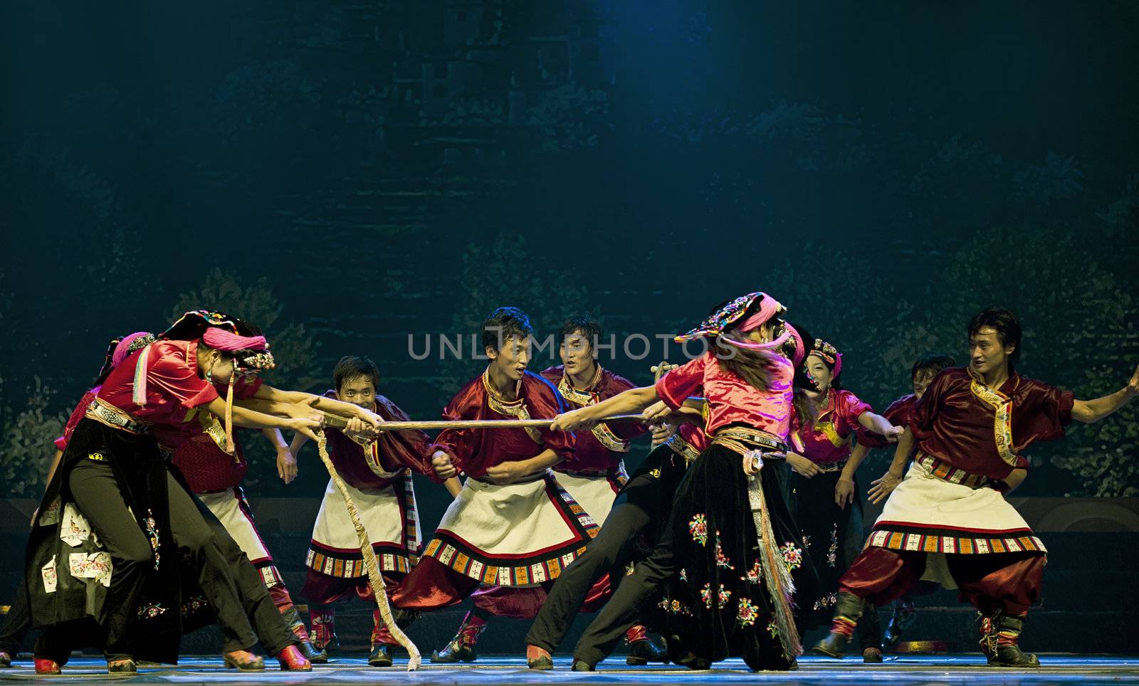 CHENGDU - SEP 27: chinese Tibetan ethnic dancers perform on stage at Sichuan experimental theater.Sep 27,2010 in Chengdu, China.